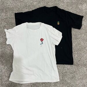 two white and black t-shirts